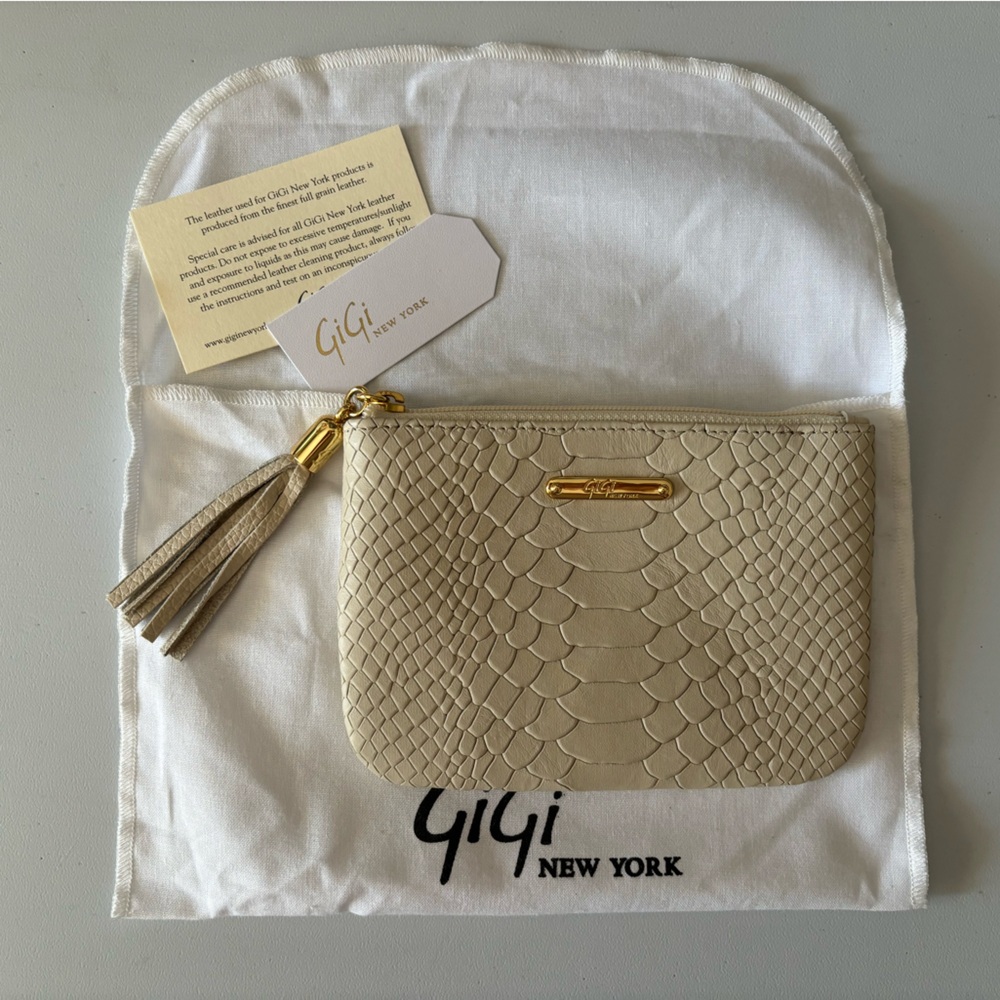 GIGI NEW YORK - NWOT Cream leather pouch and dust bag